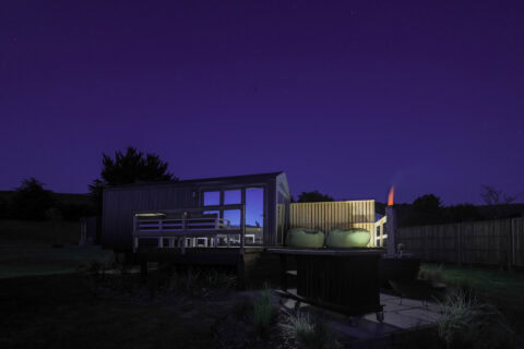 22: the unit at night under a violet sky, fire lit beside the deck, Old Mac Daddy, Elgin Valley