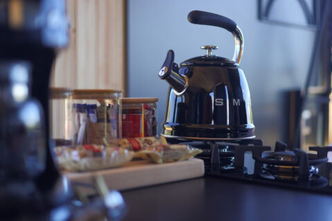 22: black SMEG kettle on the gas hob beside jars of coffee and tea, Old Mac Daddy, Elgin Valley