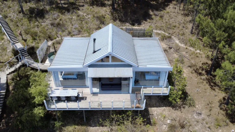 Daddy's Villa: aerial view of the villa and its deck among the pines, Old Mac Daddy, Elgin Valley