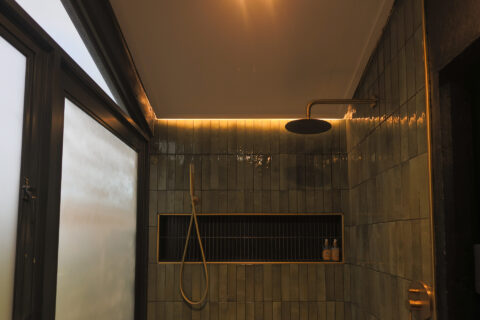 Intak: green-tiled shower with a lit niche, Old Mac Daddy, Elgin Valley