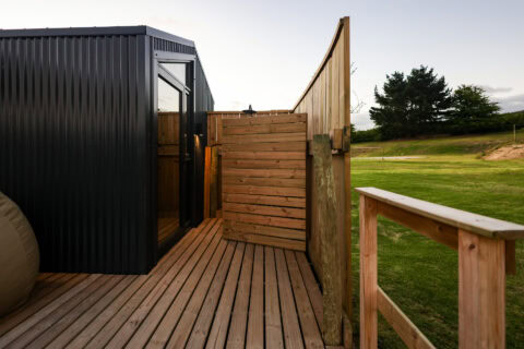 Intak: screened timber deck beside the black unit, Old Mac Daddy, Elgin Valley