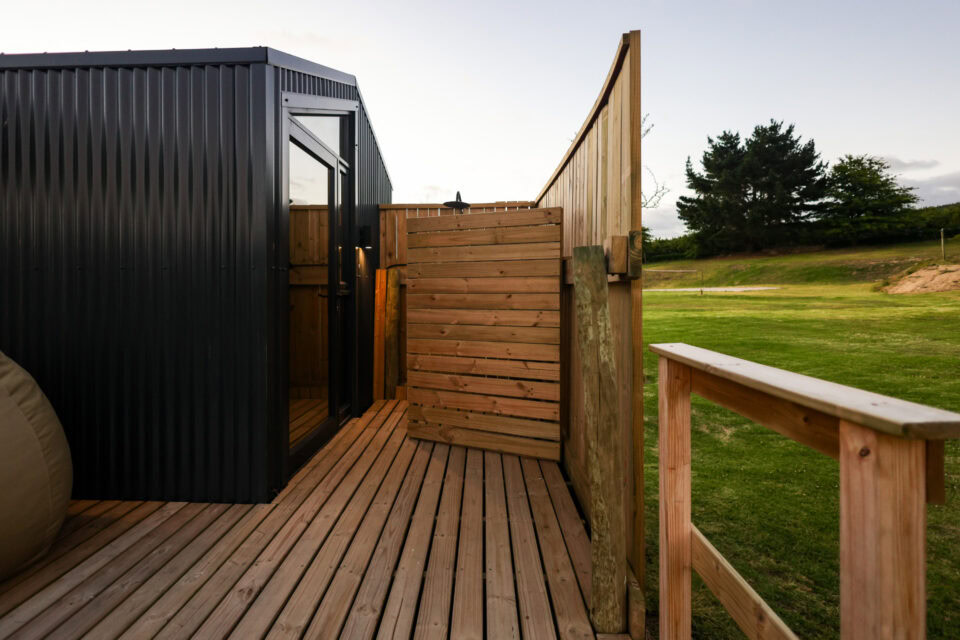 Intak: screened timber deck beside the black unit, Old Mac Daddy, Elgin Valley