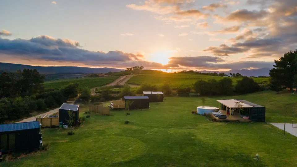 Weddings & Events Sunset over the Klein Paradys tiny homes and hills, Old Mac Daddy, Elgin Valley