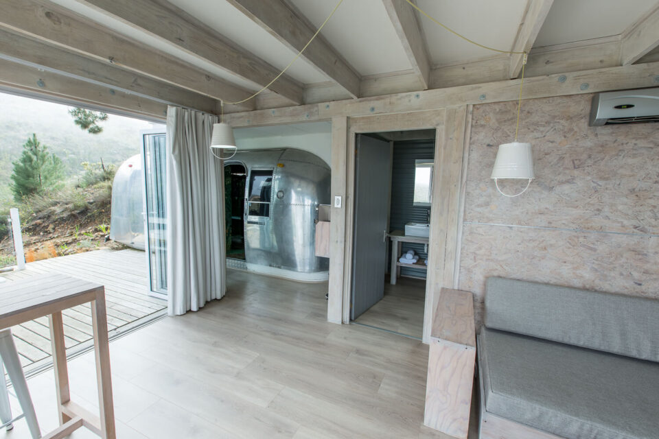 The Dream: light living room with the Airstream's doorway at the far end, Old Mac Daddy, Elgin Valley
