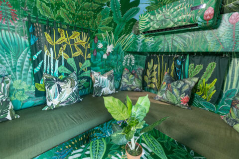 The Dream: banquette with leaf-print cushions in a lounge painted with a jungle mural, Old Mac Daddy, Elgin Valley