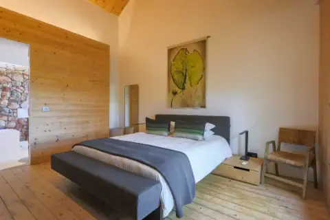 Apple Grove: double bedroom with a lily-pad print above the bed and pine-clad walls, Old Mac Daddy, Elgin Valley