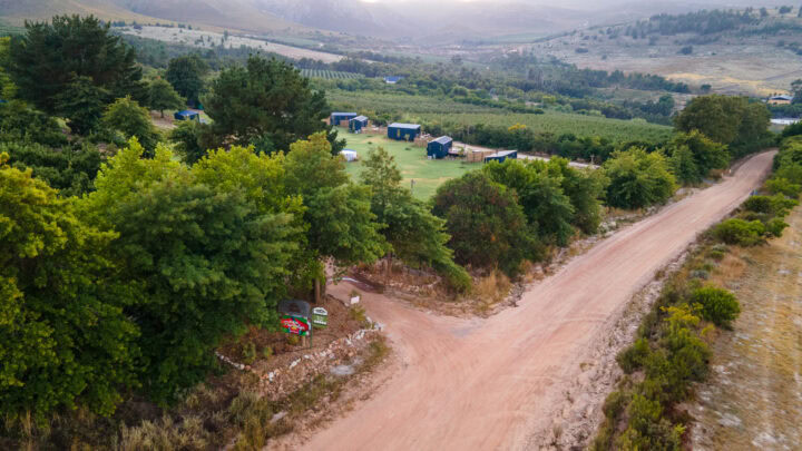 Klein Paradys: aerial view along the gravel road towards the units and orchards, Old Mac Daddy, Elgin Valley