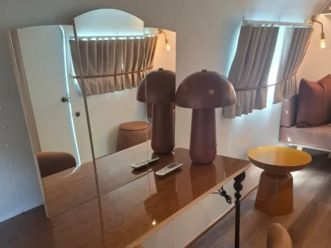 Sovereign 59: a glossy dressing table with a folding mirror, mushroom lamps and a leather chair, Old Mac Daddy, Elgin Valley