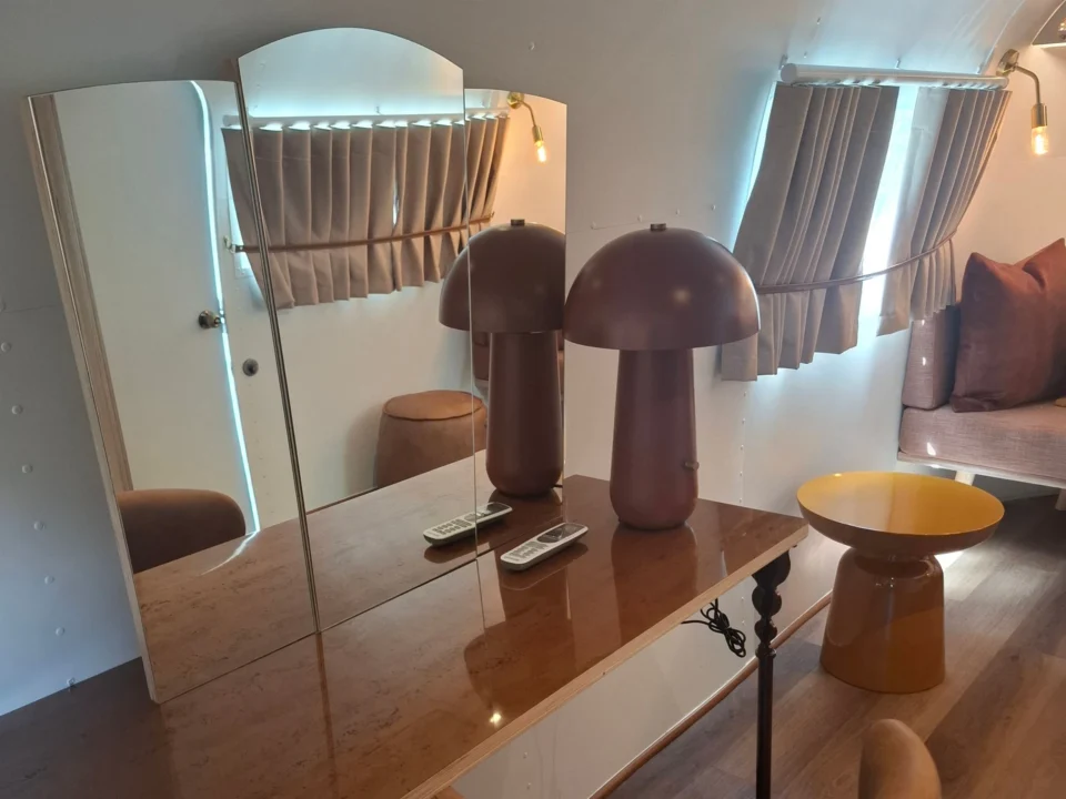 Sovereign 59: a glossy dressing table with a folding mirror, mushroom lamps and a leather chair, Old Mac Daddy, Elgin Valley