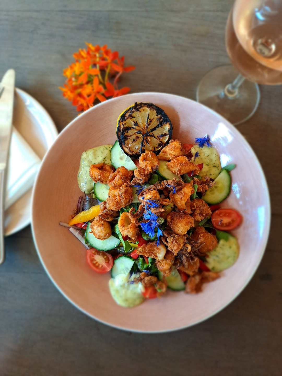A salad with crumbed pieces, cucumber and a charred lemon, Old Mac Daddy, Elgin Valley
