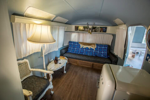 For Better or Boerewors: lounge with a blue sofa, standard lamp and armchair, Old Mac Daddy, Elgin Valley