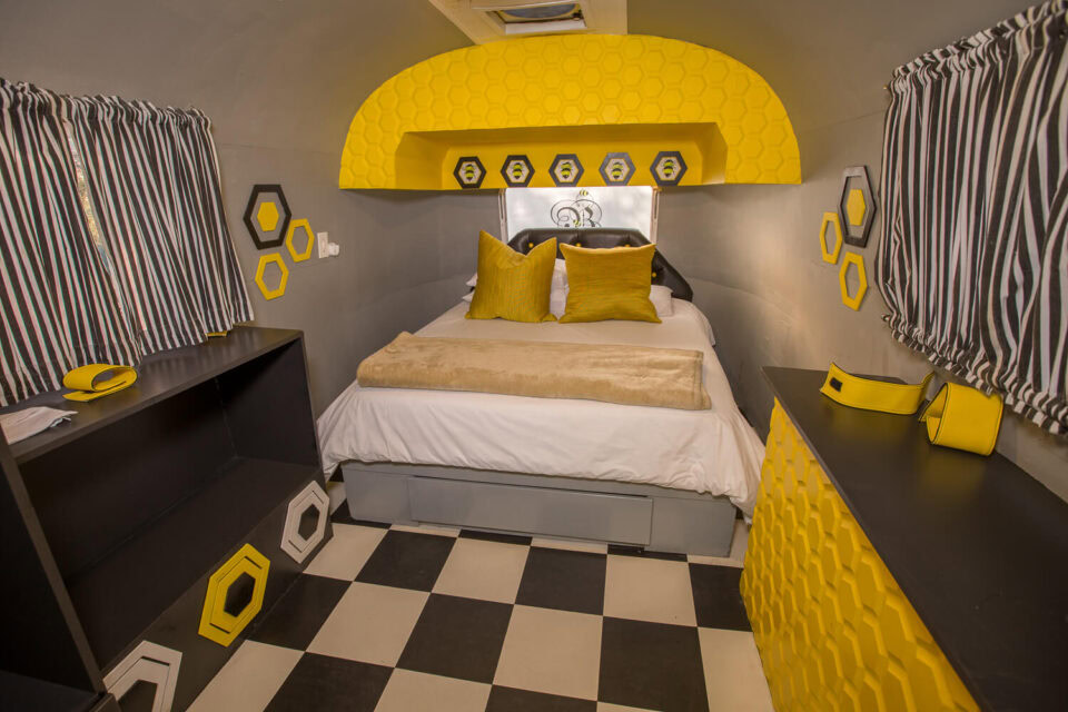 Give Bees a Chance: bed under a yellow honeycomb arch, black and white chequered floor, Old Mac Daddy, Elgin Valley