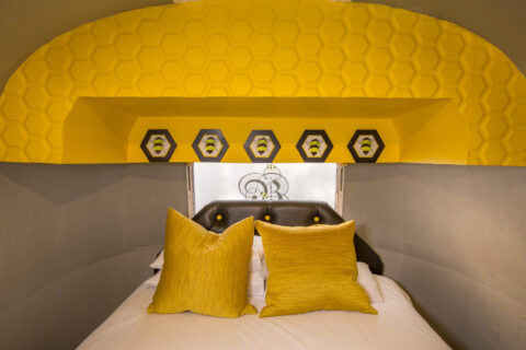 Give Bees a Chance: bed with yellow cushions under the honeycomb arch, Old Mac Daddy, Elgin Valley