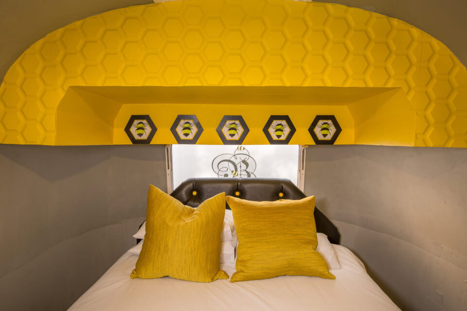 Give Bees a Chance: bed with yellow cushions under the honeycomb arch, Old Mac Daddy, Elgin Valley