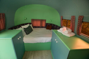 Love Cake: Airstream bed between mint-green cabinets, Old Mac Daddy, Elgin Valley