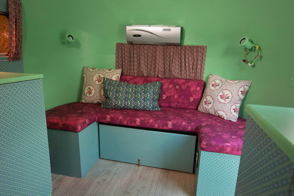 Love Cake: pink banquette with floral cushions against mint-green walls, Old Mac Daddy, Elgin Valley