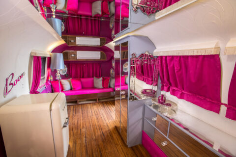 Mills & Boon: hot-pink banquette, cream fridge and mirrored cabinet, Old Mac Daddy, Elgin Valley