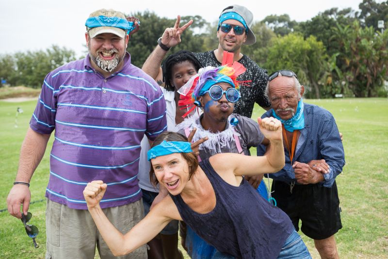 Team in fancy-dress props cheering on the lawn, Old Mac Daddy, Elgin Valley