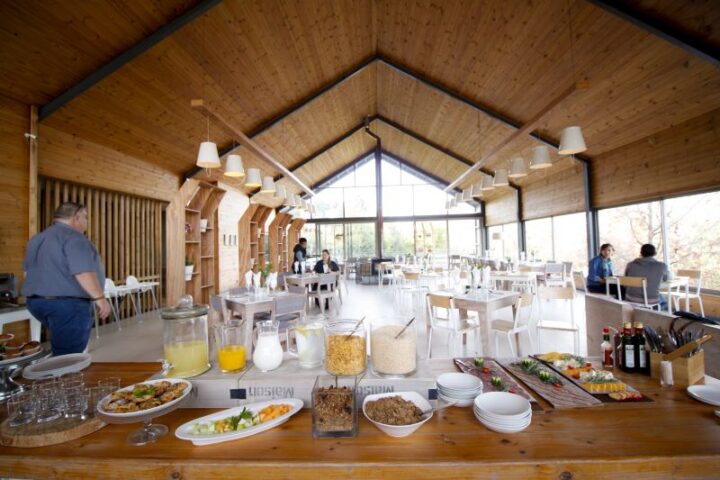 Breakfast buffet with juices, cereals and hot dishes in the Barn restaurant, Old Mac Daddy, Elgin Valley