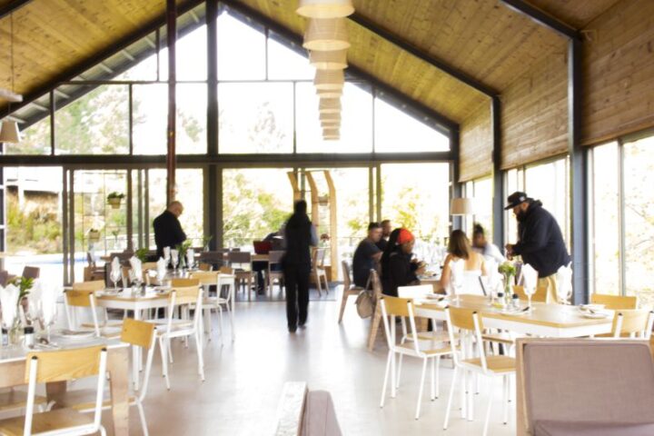 Diners and staff in the bright Barn restaurant, Old Mac Daddy, Elgin Valley