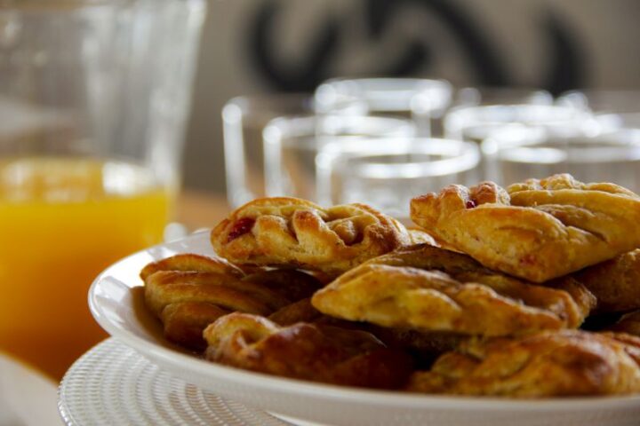 A plate of pastries beside glasses of orange juice, Old Mac Daddy, Elgin Valley