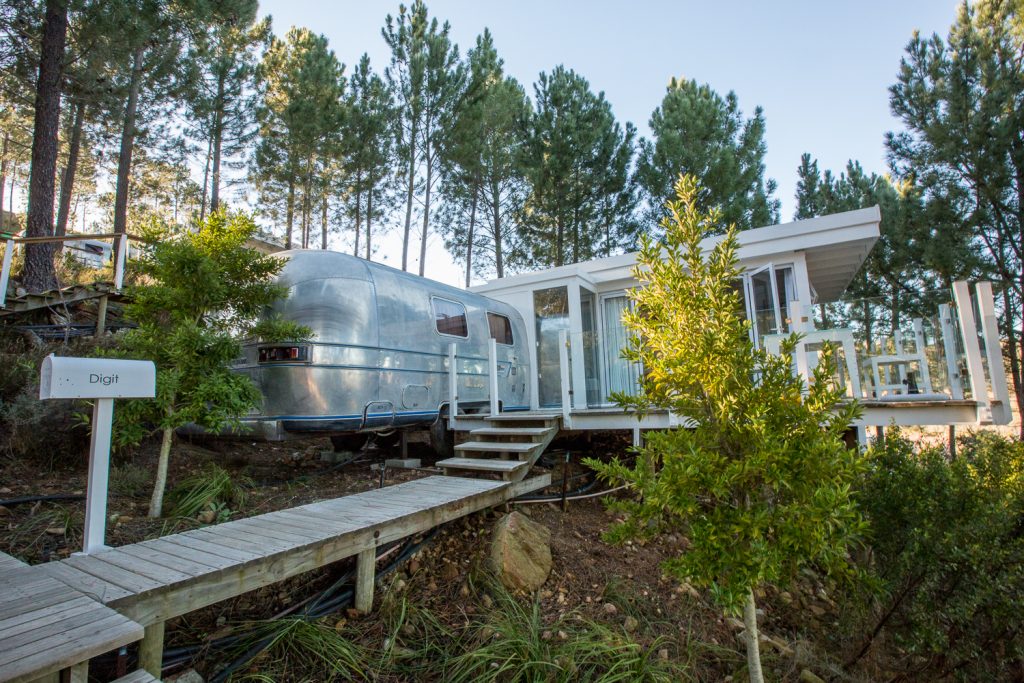 Dig'It: the Airstream and its glass-walled deck, with the name mailbox by the boardwalk, Old Mac Daddy, Elgin Valley