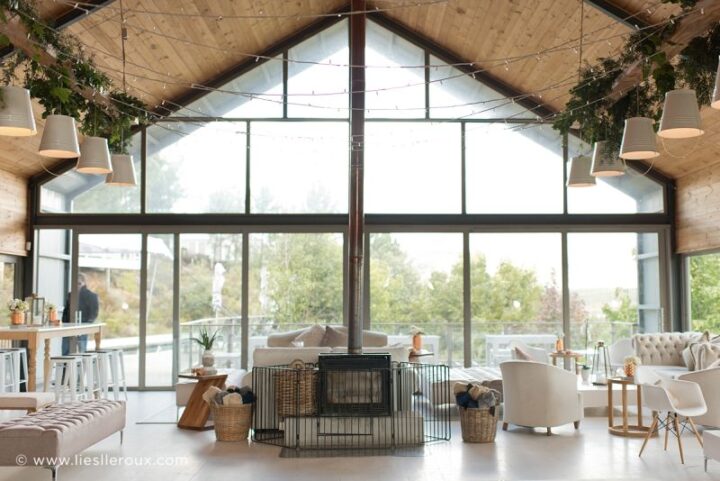 The Barn dressed as a lounge around the wood stove, beneath the glass gable, Old Mac Daddy, Elgin Valley