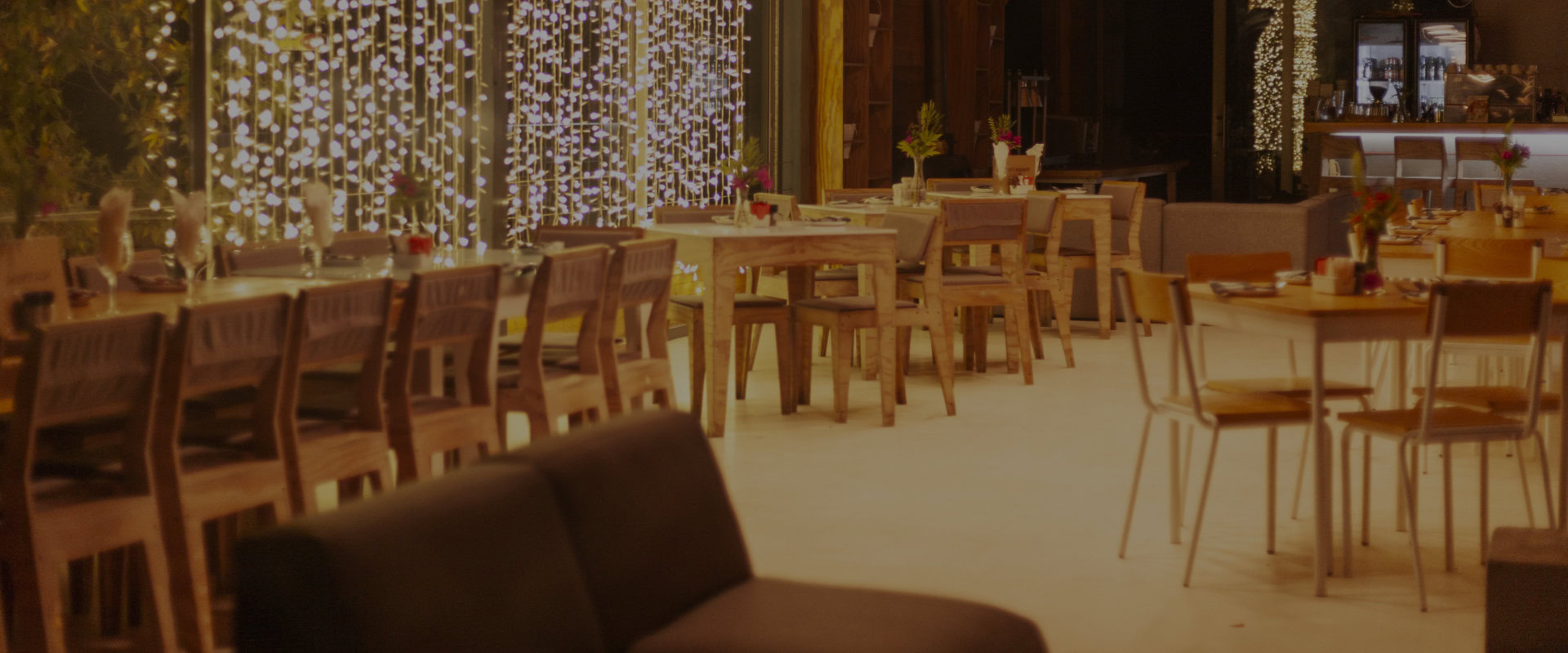 The Barn restaurant with tables set beneath a curtain of fairy lights, Old Mac Daddy, Elgin Valley